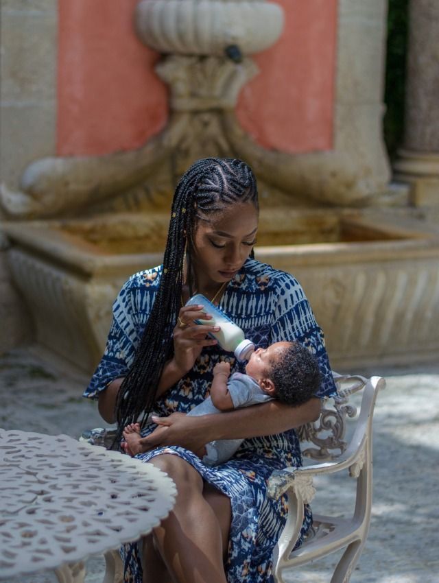 Mother feeding her baby